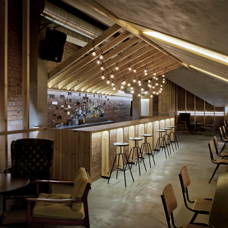 Bar in an attic space in Minsk by Inblum Architects
