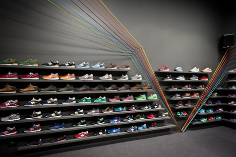 Run Colors trainers store by Modelina Architekci