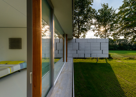Dutch studio Inbo hides a transparent house behind a grove of trees