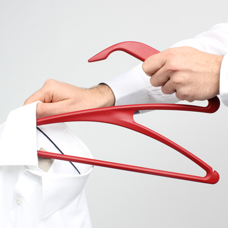 Z-shaped clothes hanger easily fits through the neck hole