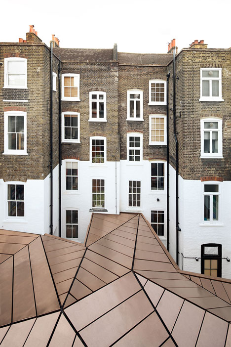 Great James Street Office extension with a faceted copper roof by Emrys Architects