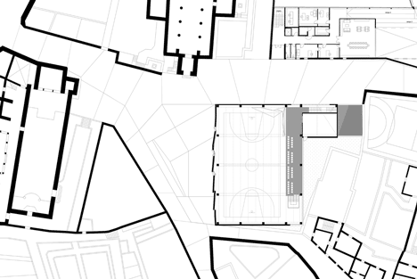 Ground floor plan of Concrete-clad sports hall by Idis Turato with both faceted and bumpy facades