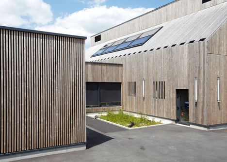 Timber-clad kindergarten in France by Topos Architecture
