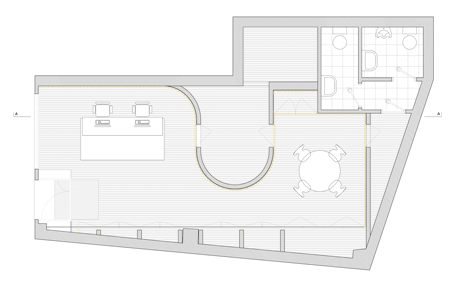Floor plan of renovated office of Architecture studio with a bulging wall by domohomo architects