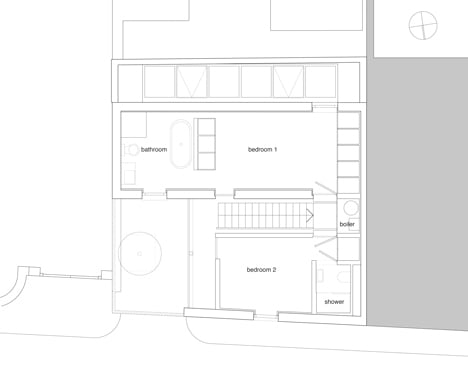 First floor plan of Blackbox mews house by Form_art Architects has brick walls that continue inside