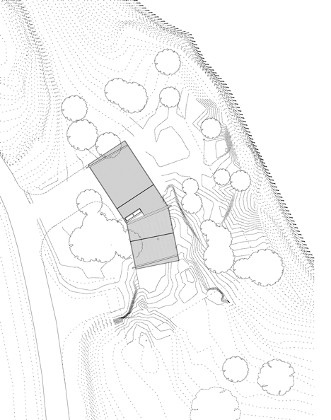 Site plan of Double-gabled house overlooking a Norwegian fjord by Schjelderup Trondahl Architects