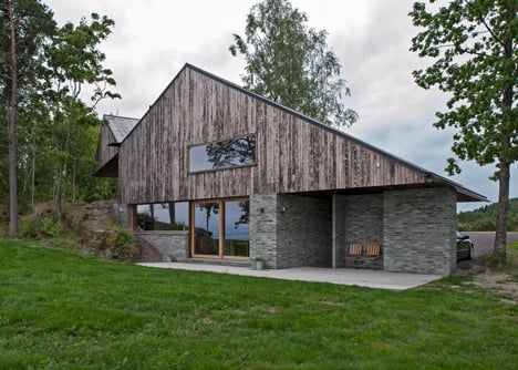 Double-gabled house overlooking a Norwegian fjord by Schjelderup Trondahl Architects