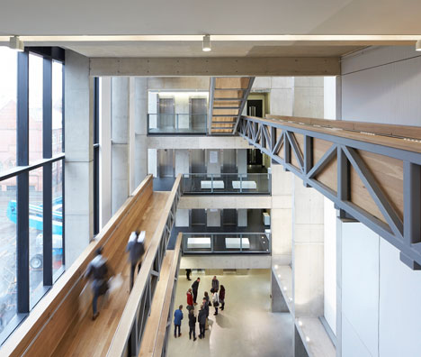 Manchester Metropolitan University art school extension with wooden stairs and bridges by Feilden Clegg Bradley Studios