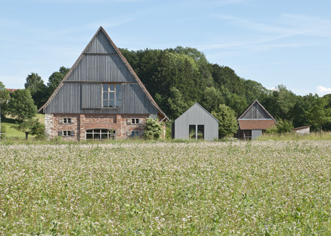 Small museum pavilion designed to resemble a rural shed by Von M