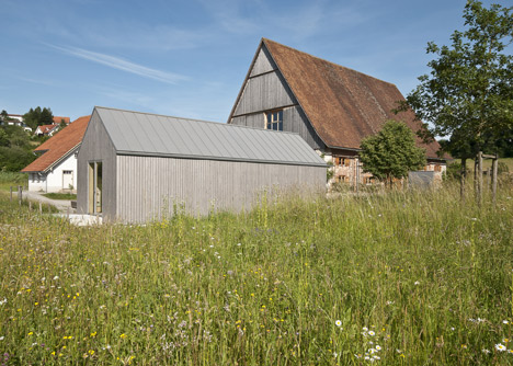Small museum pavilion designed to resemble a rural shed by Von M