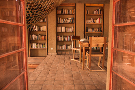 Children's library in Africa with rammed earth walls by BC Architects