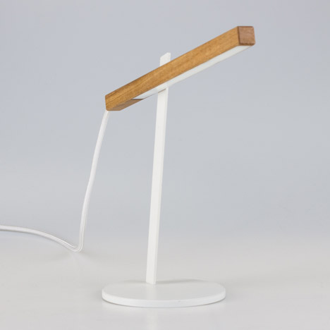 Two-piece magnetic Magnon desk lamp by Ilya Tkach