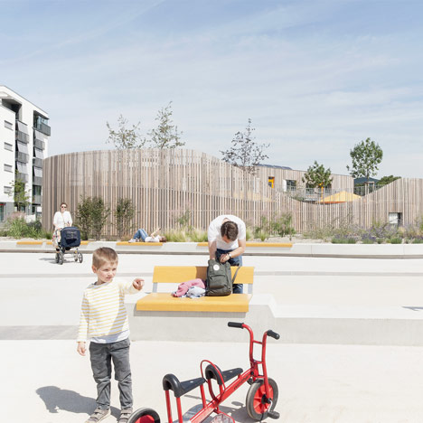 Timber-clad kindergarten by Behnisch Architekten opens in new housing district