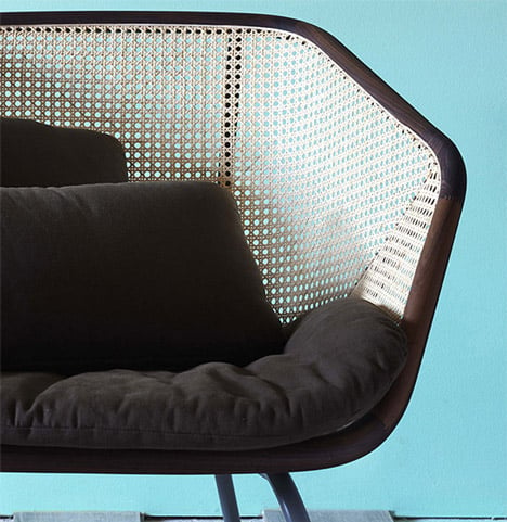 Colony armchair by Skrivo mixes steam-bent wood and rattan