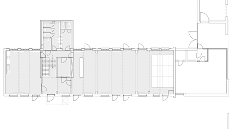 Ground floor plan after renovation of Community Centre Woesten by Atelier Tom Vanhee has a contrasting gabled extension