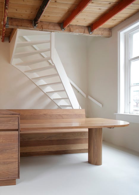 Unknown Architects updates 200-year-old house with twisting staircase and wooden furniture