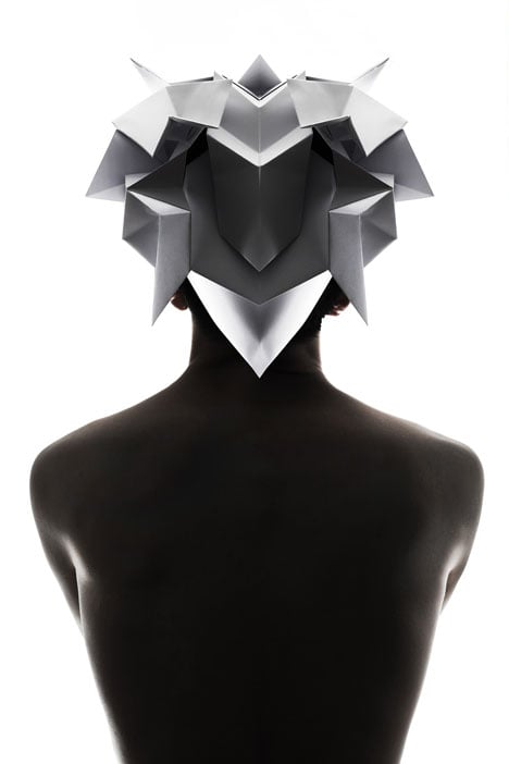 Origami headgear folded to resemble mythological creatures