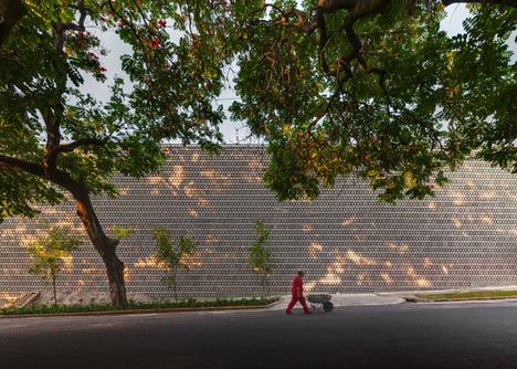 Perforated concrete walls encase La Tallera gallery by Frida Escobedo