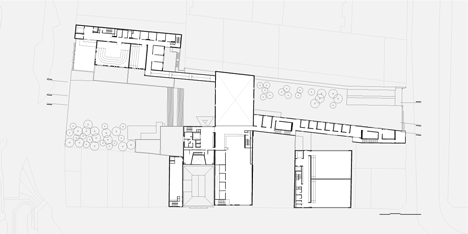 Second floor plan of Praca das Artes by Brasil Arquitetura features concrete boxes projecting over a public plaza
