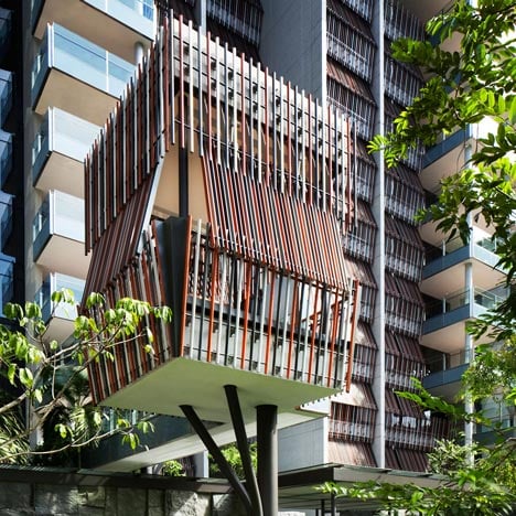 Raised outdoor cabins connected to Goodwood Residence apartments by WOHA