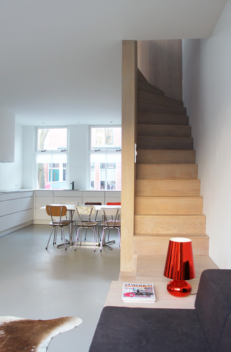 8A Architecten renovate house with combined staircase and sofa