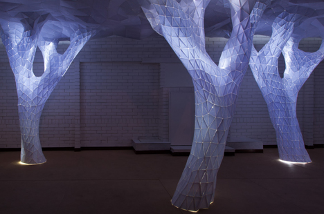 Glowing indoor forest made from paper by Orproject