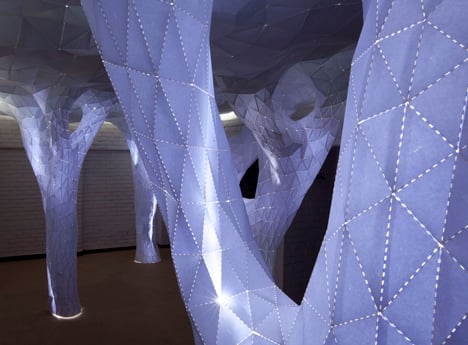 Glowing indoor forest made from paper by Orproject
