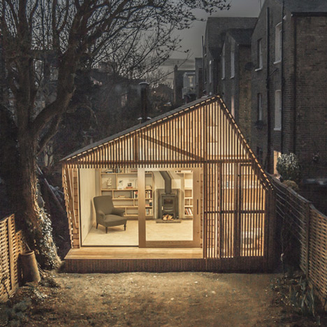 Light glows through the cedar facade of&ltbr /&gt Writer's Shed by Weston Surman &amp Deane