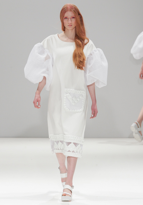 Silicon details outline garments in Xiao Li's Autumn Winter 2014 collection