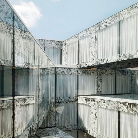 Allianz Headquarters by Wiel Arets features glass fritted to reference Mies' Barcelona Pavilion