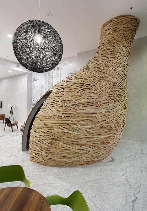 Giant timber nest provides meeting room at Baya Park offices by Planet 3 Studios
