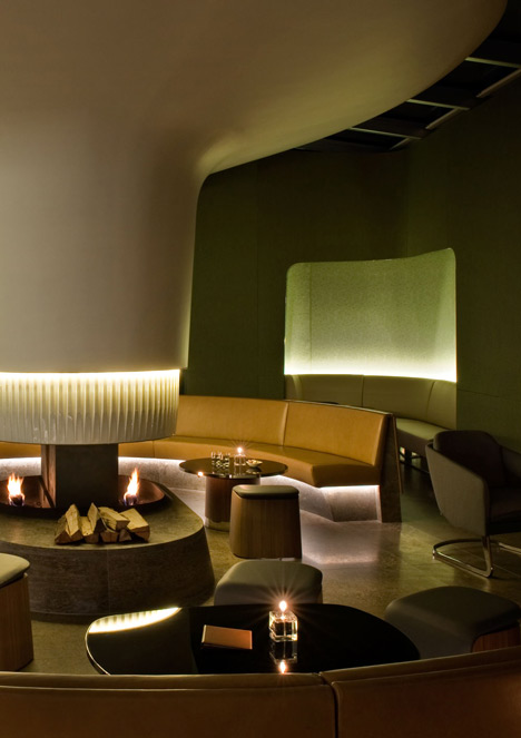 Nature-inspired hotel by Jouin Manku features an organic fireplace