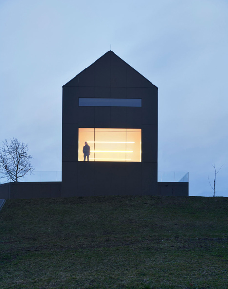 Black Barn by Arhitektura d.o.o. provides panoramic views of the Slovenian countryside