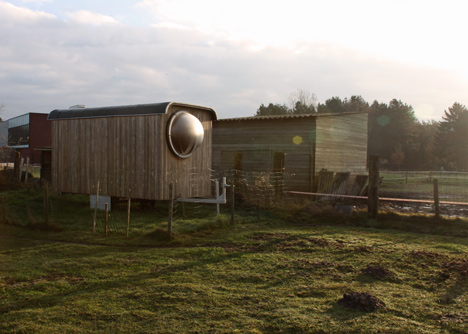 Abandoned trailer converted into garden hideaway by Karel Verstraeten