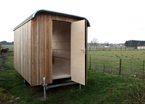 Abandoned trailer converted into garden hideaway by Karel Verstraeten