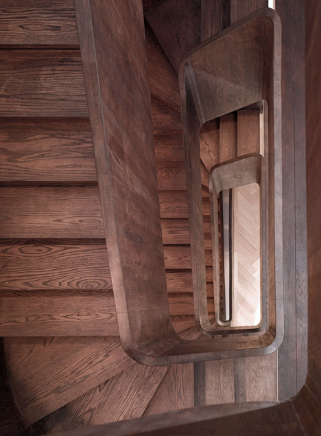 Curvacious oak staircase ascends through converted London convent by John Smart Architects