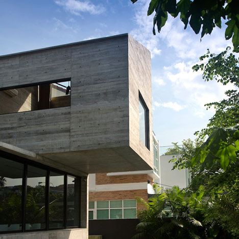 Formwerkz Architects house extension features cantilevered concrete box
