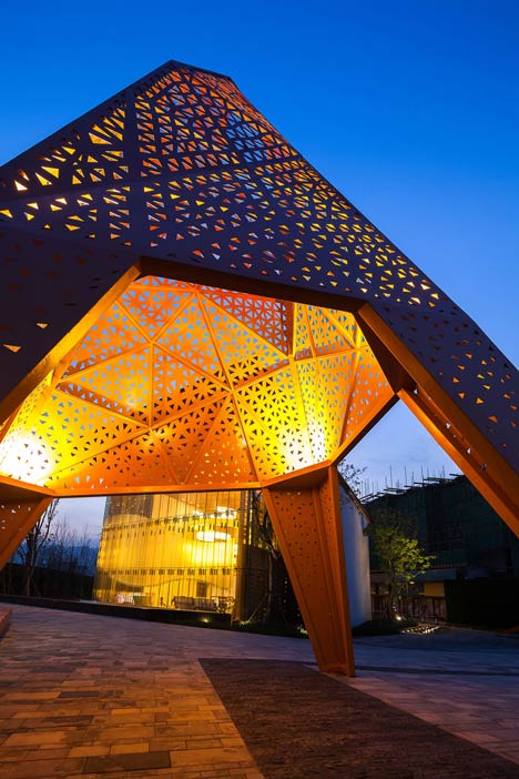 Four-legged perforated metal pavilions rise above Fengming Mountain Park