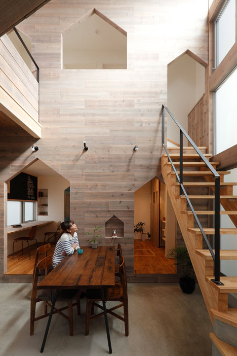 House-shaped doorways puncture Hazukashi House by Alts Design Office