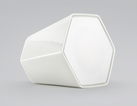 Wireless hexagonal ceramic speaker connects to others by rolling over