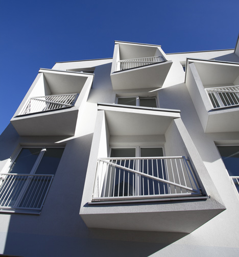 Angular balconies stretch towards sunlight at North Star Apartments by Nice Architects