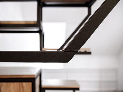 Suspended staircase combined with desk and storage space by Mieke Meijer