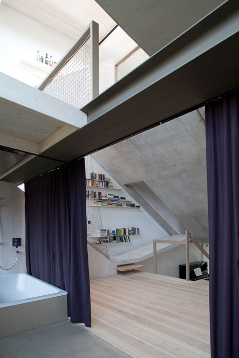 Townhouse B14 by XTH-berlin has slanted walls and doors