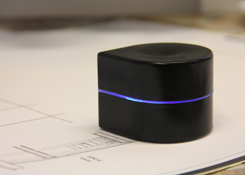 Pocket-sized printer creates documents by rolling across pages