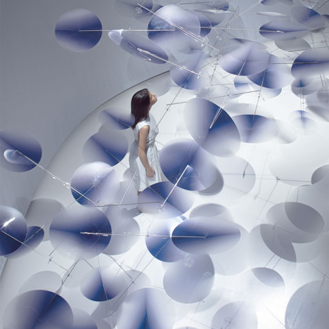 Moving plastic petals balanced in Interconnection installation by Nao Tamura