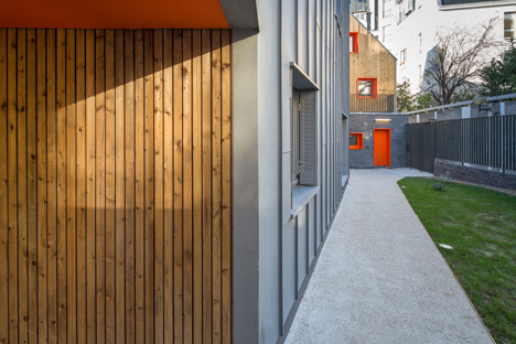 Social housing by Vous Êtes Ici Architectes slots between buildings in Paris