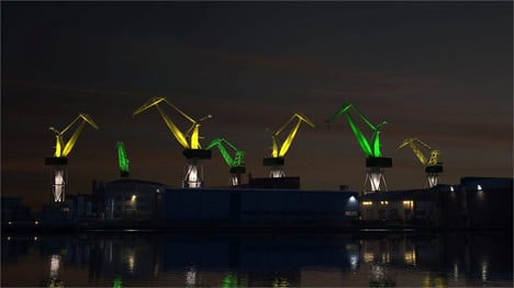 Green and yellow lights represent Pula's official colours