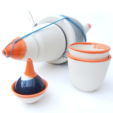 Large lachrymatory with orange cups by Luke Bishop