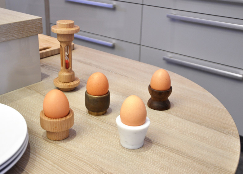 Oliver Richardson stacks kitchen utensils into miniature totem poles