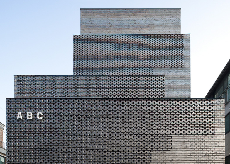 Perforated brick stairwells front Wise Architecture's ABC office block